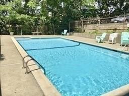 205 Independence Ave Unit 223, Quincy, MA 02169 - community pool featuring view of scattered trees