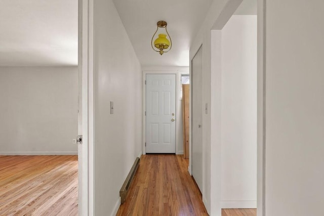 155 Glen Charlie Rd, Wareham, MA 02538 - hall featuring wood finished floors and a baseboard radiator