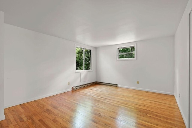 155 Glen Charlie Rd, Wareham, MA 02538 - unfurnished room featuring baseboard heating and light wood-type flooring