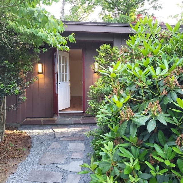 155 Glen Charlie Rd, Wareham, MA 02538 - doorway to property featuring board and batten siding