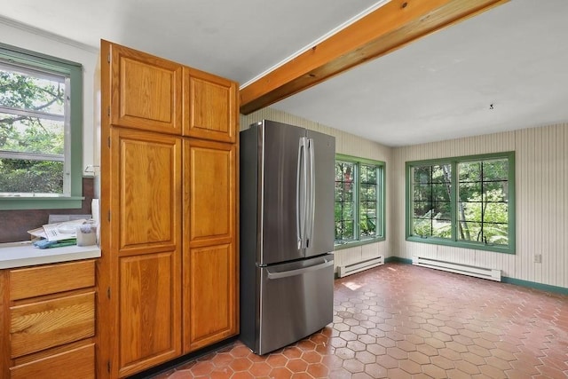 155 Glen Charlie Rd, Wareham, MA 02538 - kitchen with freestanding refrigerator, baseboard heating, light countertops, and brown cabinetry