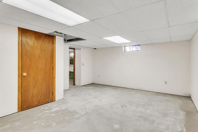 basement featuring a drop ceiling