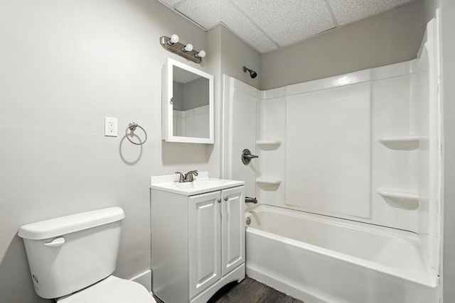 782 Sumner Ave, Springfield, MA 01108 - bathroom with vanity, a drop ceiling, washtub / shower combination, and wood finished floors