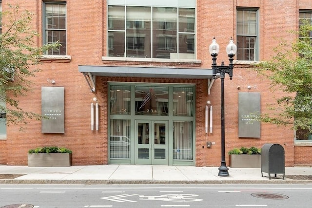 234 Causeway St Unit 723, Boston, MA 02114 - property entrance featuring french doors and brick siding