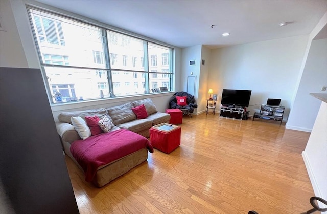 234 Causeway St Unit 723, Boston, MA 02114 - living room featuring wood finished floors, baseboards, and recessed lighting