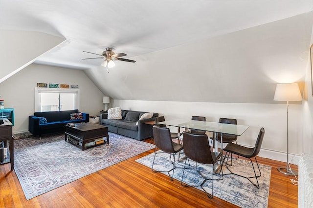 24 Central St, Somerville, MA 02143 - living room with wood finished floors, vaulted ceiling, ceiling fan, and baseboards