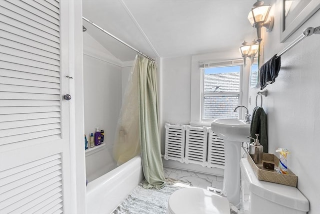 24 Central St, Somerville, MA 02143 - full bathroom featuring shower / bath combo with shower curtain, marble look tiles, toilet, and lofted ceiling