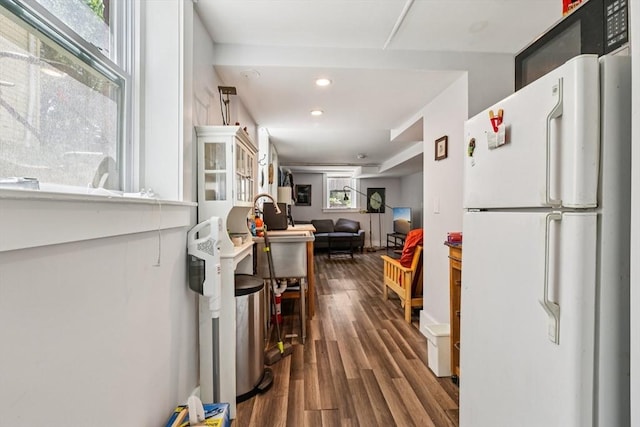 24 Central St, Somerville, MA 02143 - kitchen featuring freestanding refrigerator, dark wood-style flooring, and recessed lighting