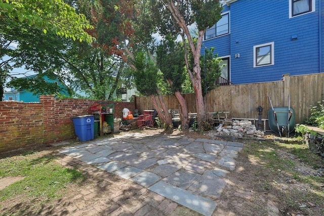 24 Central St, Somerville, MA 02143 - fenced backyard with a patio