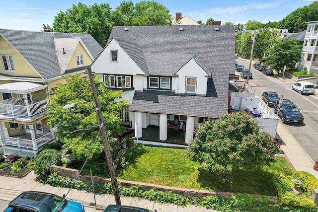 24 Central St, Somerville, MA 02143 - view of front of property with stucco siding and a shingled roof