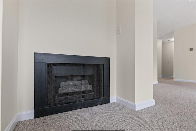 9 Davis Rd Unit C10, Acton, MA 01720 - detailed view of a fireplace and carpet floors
