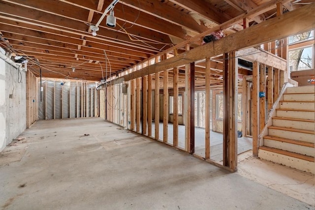 basement featuring stairs