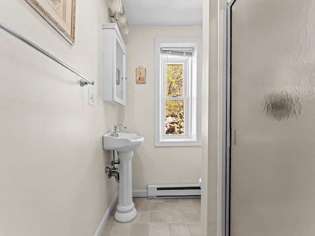 full bathroom with baseboards, a baseboard radiator, tile patterned floors, and a shower stall