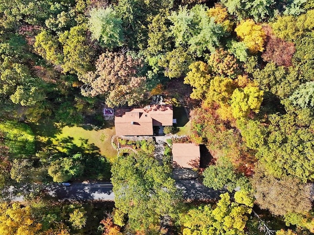 drone / aerial view with a view of trees