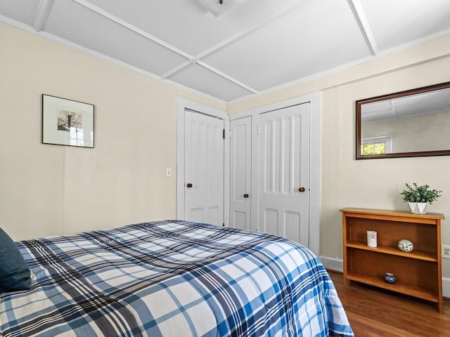 bedroom with wood finished floors