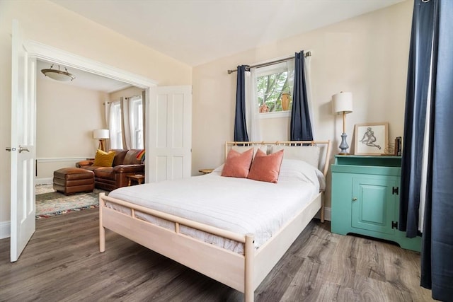 11 Sedgwick St Unit 8, Boston, MA 02130 - bedroom with wood finished floors and baseboards