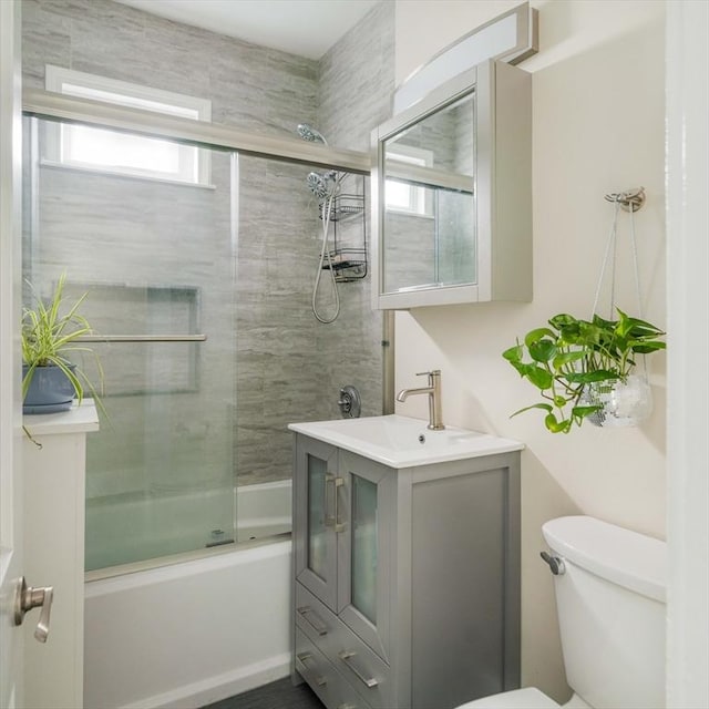 11 Sedgwick St Unit 8, Boston, MA 02130 - bathroom featuring vanity, healthy amount of natural light, and enclosed tub / shower combo