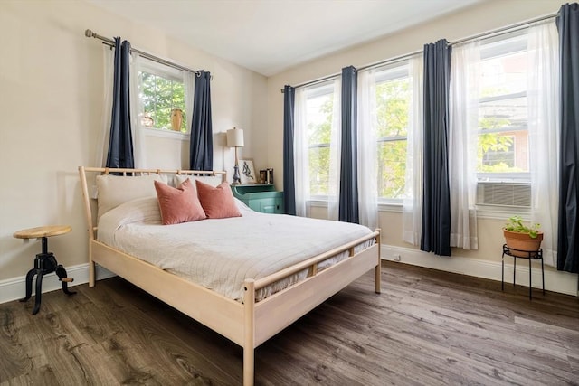 11 Sedgwick St Unit 8, Boston, MA 02130 - bedroom featuring wood finished floors and cooling unit