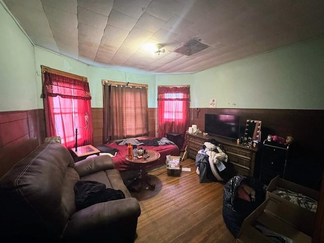 81 High St, West Springfield, MA 01089 - living room with wainscoting, wood finished floors, and wood walls