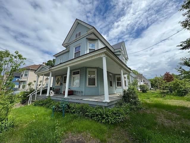 81 High St, West Springfield, MA 01089 - victorian home featuring covered porch