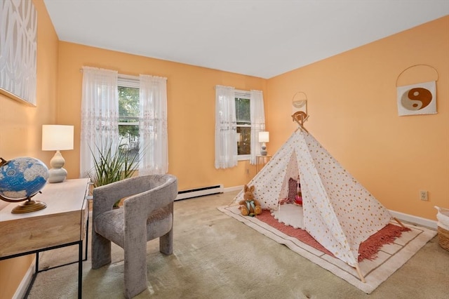 game room featuring carpet and a baseboard radiator