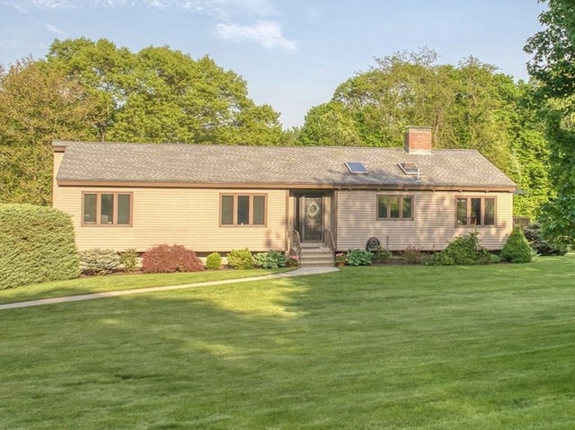 34 Marlboro St, Hudson, MA 01749 - view of front of home featuring a front yard and a chimney