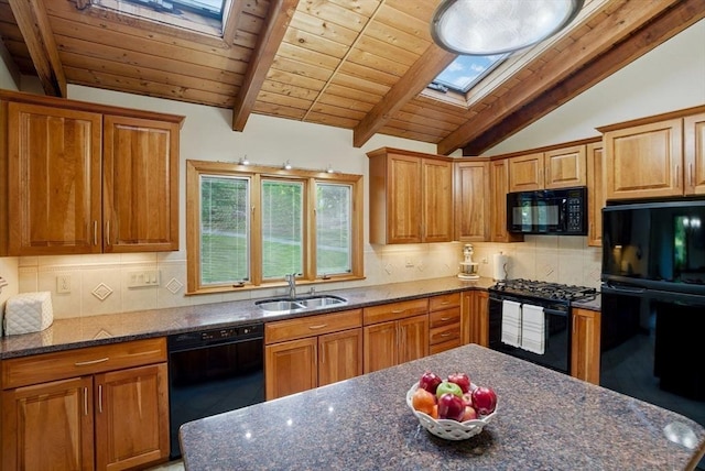 34 Marlboro St, Hudson, MA 01749 - kitchen featuring a skylight, black appliances, a sink, wooden ceiling, and tasteful backsplash