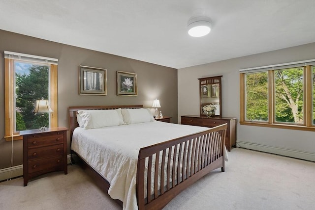 34 Marlboro St, Hudson, MA 01749 - bedroom featuring carpet flooring, baseboard heating, and baseboards