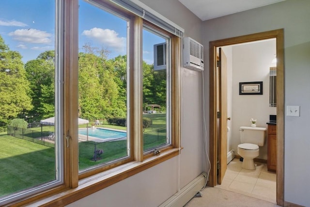 34 Marlboro St, Hudson, MA 01749 - hall with light tile patterned floors and an AC wall unit