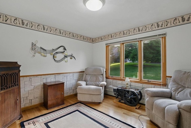 34 Marlboro St, Hudson, MA 01749 - sitting room featuring wood finished floors and baseboard heating