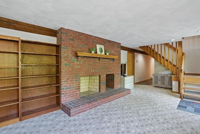 34 Marlboro St, Hudson, MA 01749 - unfurnished living room featuring stairs, a brick fireplace, and carpet flooring