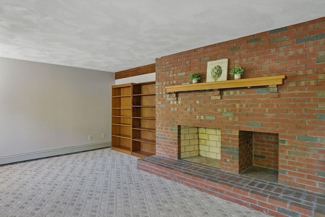 34 Marlboro St, Hudson, MA 01749 - unfurnished living room featuring baseboards, carpet, built in shelves, a textured ceiling, and a baseboard radiator