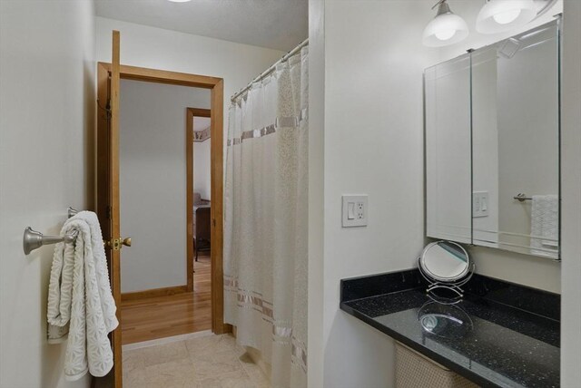 34 Marlboro St, Hudson, MA 01749 - full bathroom with vanity, tile patterned flooring, and a shower with curtain