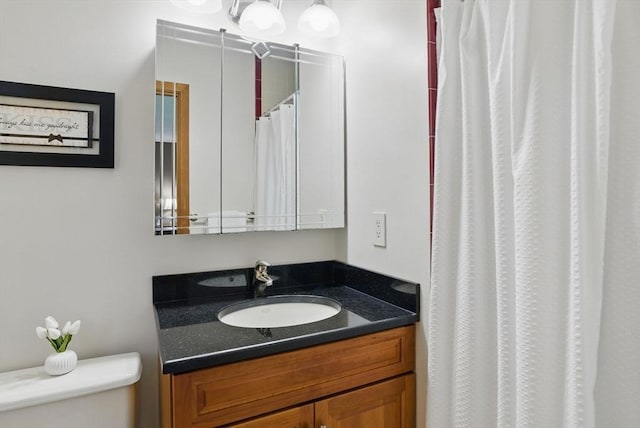 34 Marlboro St, Hudson, MA 01749 - bathroom featuring toilet, vanity, and a shower with shower curtain