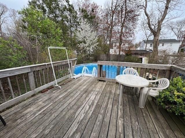 59 Eddy St, Springfield, MA 01104 - deck featuring an outdoor pool