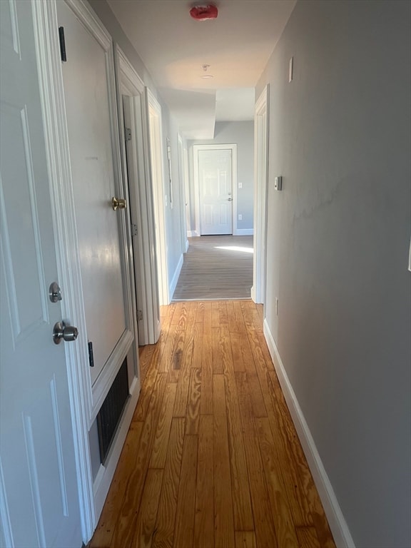 hall featuring light hardwood / wood-style floors