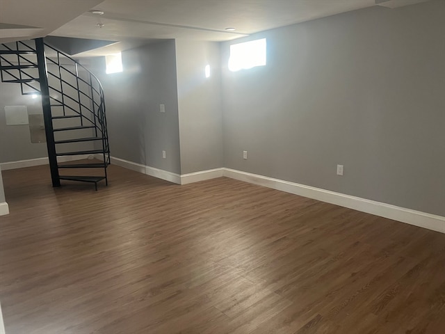 basement featuring dark wood-type flooring