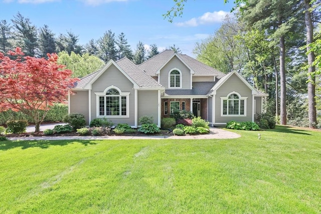 20 Ericka Cir, East Longmeadow, MA 01028 - view of front facade featuring a front lawn and a shingled roof