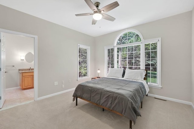 20 Ericka Cir, East Longmeadow, MA 01028 - bedroom with baseboards, light colored carpet, a sink, and connected bathroom