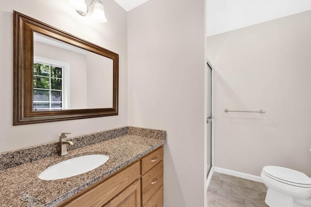 20 Ericka Cir, East Longmeadow, MA 01028 - full bath featuring vanity, a stall shower, toilet, and baseboards