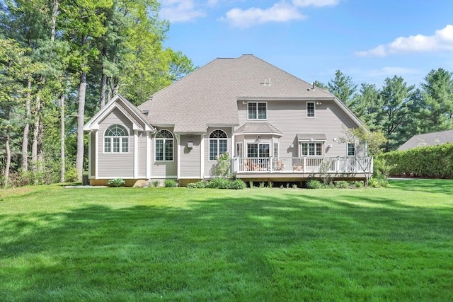 20 Ericka Cir, East Longmeadow, MA 01028 - back of house with a lawn, a deck, and a shingled roof