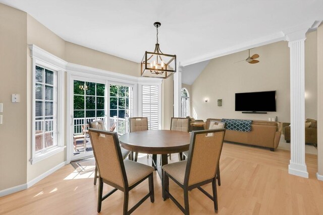 20 Ericka Cir, East Longmeadow, MA 01028 - dining room featuring ornate columns, light wood-style floors, lofted ceiling, a chandelier, and baseboards