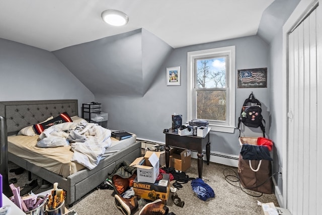 bedroom featuring carpet floors, baseboard heating, and vaulted ceiling