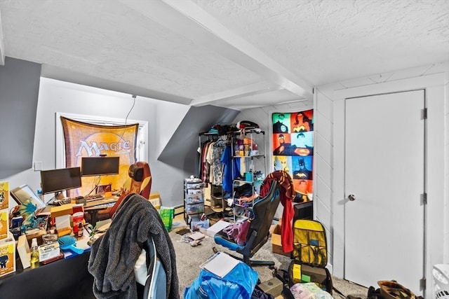 interior space featuring carpet floors and a textured ceiling