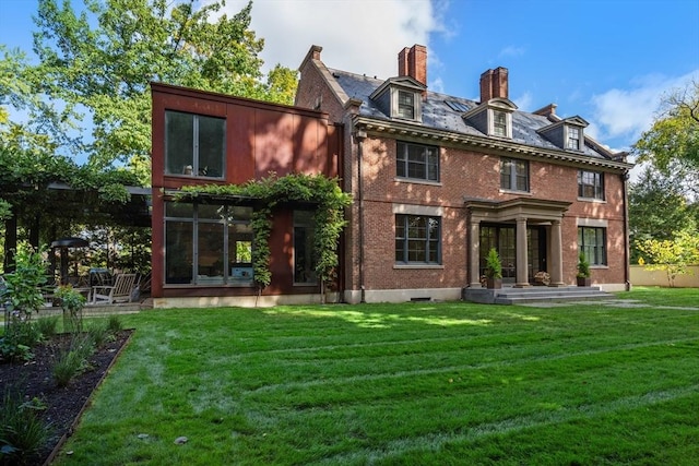 55 Fayerweather St, Cambridge, MA 02138 - rear view of property with a yard and brick siding