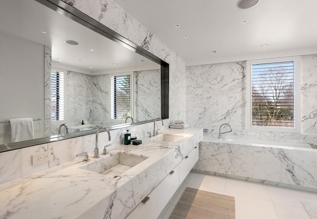 55 Fayerweather St, Cambridge, MA 02138 - full bath with recessed lighting, double vanity, a garden tub, and a sink