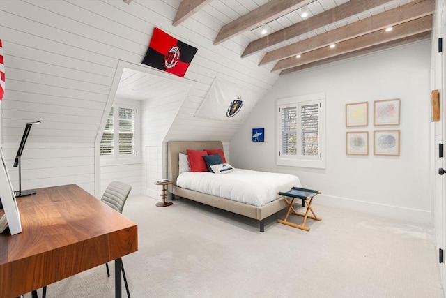 55 Fayerweather St, Cambridge, MA 02138 - carpeted bedroom featuring baseboards and vaulted ceiling with beams