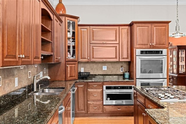 15 Henrys Ln, Norwell, MA 02061 - kitchen with a sink, brown cabinets, stainless steel appliances, and ornamental molding