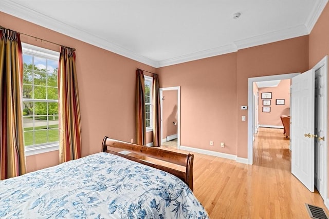 15 Henrys Ln, Norwell, MA 02061 - bedroom featuring light wood-type flooring, crown molding, and baseboards