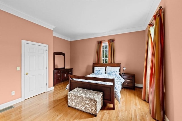 15 Henrys Ln, Norwell, MA 02061 - bedroom with light wood-style flooring, baseboards, ornamental molding, and a baseboard radiator